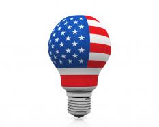 American flag on bulb shows idea generation stock photo