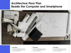 Architecture floor plan beside the computer and smartphone