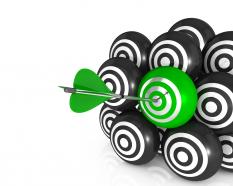 Arrows hits of on green target board stock photo