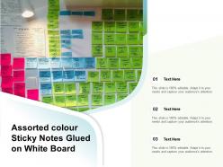 Assorted colour sticky notes glued on white board