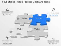 At four staged puzzle process chart and icons powerpoint template