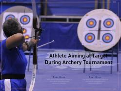 Athlete aiming at target during archery tournament