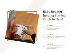 Baby boomer holding playing cards in hand