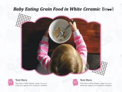 Baby eating grain food in white ceramic bowl