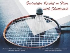 Badminton racket on floor with shuttlecock
