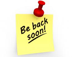 Be back soon text on sticky note stock photo