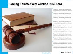 Bidding hammer with auction rule book