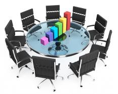 Black chairs with colored bar graph stock photo