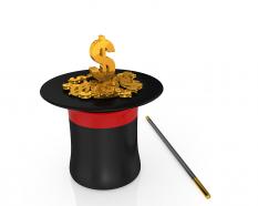 Black hat with golden dollar and stick magic stock photo
