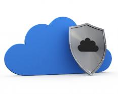 Blue Cloud With Safety Shield For Security Stock Photo