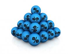 Blue colored balls with discount symbol stock photo