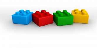 Blue red green yellow lego blocks in line stock photo
