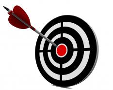 Blue target dart with red arrow stock photo
