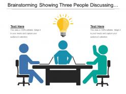 Brainstorming showing three people discussing and bulb