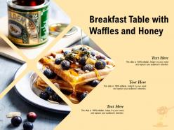 Breakfast table with waffles and honey