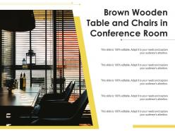 Brown wooden table and chairs in conference room