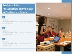 Business sales presentation on projector in conference room