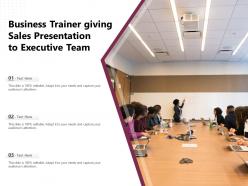 Business trainer giving sales presentation to executive team