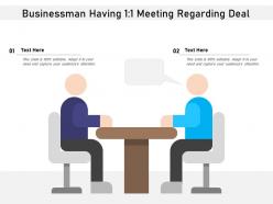 Businessman having 1 1 meeting regarding deal