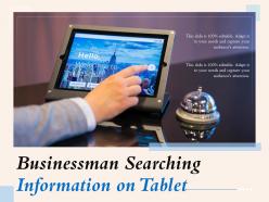 Businessman Searching Information On Tablet