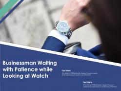 Businessman waiting with patience while looking at watch