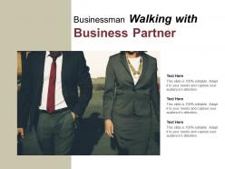 Businessman walking with business partner