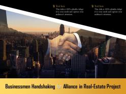 Businessmen handshaking for alliance in real estate project