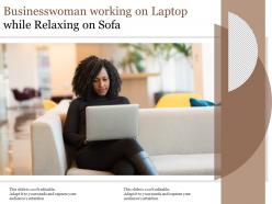 Businesswoman working on laptop while relaxing on sofa