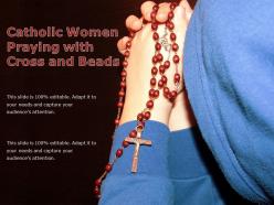 Catholic women praying with cross and beads