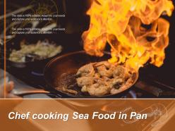 Chef cooking sea food in pan