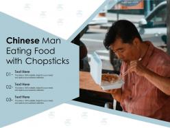 Chinese man eating food with chopsticks