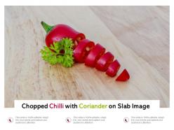 Chopped chilli with coriander on slab image