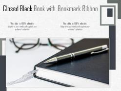 Closed black book with bookmark ribbon