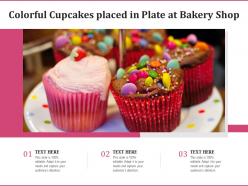 Colorful cupcakes placed in plate at bakery shop