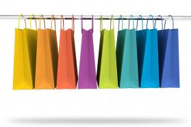 Colorful shopping bags in hanger stock photo