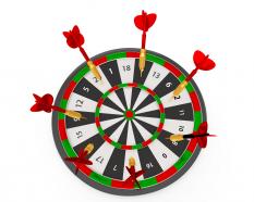 Colorful target board with red arrows showing success concept stock photo