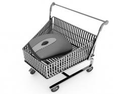 Computer mouse in shopping cart stock photo