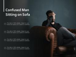 Confused man sitting on sofa