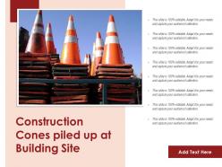 Construction cones piled up at building site