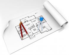 Construction plan in roll with scale and pencil for architecture stock photo