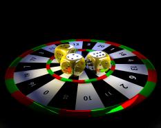 Dart board with yellow colored dices target stock photo