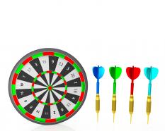 Darts with dartboard showing the concept of business target stock photo