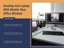 Desktop and laptop with mobile near office window