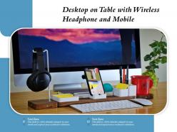 Desktop on table with wireless headphone and mobile