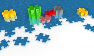 Different colored puzzles on white background stock photo