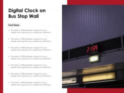 Digital clock on bus stop wall