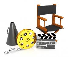 Directors chair with clap board and megaphone for movie shooting stock photo