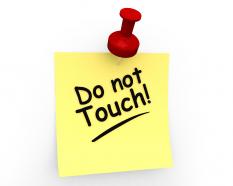 Do not touch text on sticky note stock photo