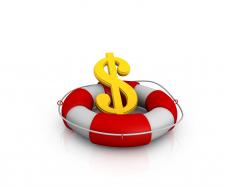 Dollar symbol in lifesaver showing concept of financial crisis stock photo