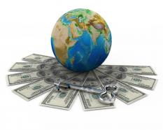 Dollars around the globe for finance stock photo